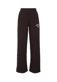 Schwarze Jogginghosen aus weichem Stoff, mit einem elastischen Taillenbund, seitlichen Taschen und einem weißen bedruckten Logo auf dem linken Oberschenkel.