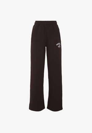 Pantalon de jogging noir en tissu doux, avec une taille élastique, des poches latérales et un logo blanc imprimé sur la cuisse gauche.