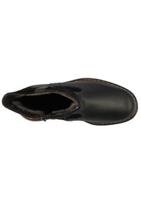 Bottine en cuir noir avec doublure textile, fermeture éclair sur le côté et semelle en caoutchouc marron. Légère rembourrage le long du col pour plus de confort.