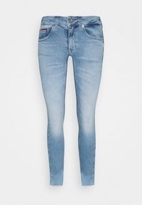 Světle modré skinny džíny s předními kapsami, zapínáním na knoflík, vybledlým vzhledem a surovým lemem na kotnících.