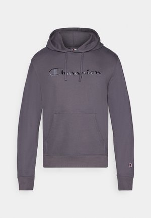 Grauer Kapuzenpullover mit Kordelzug, ausgestattet mit einem großen schwarzen "Champion"-Logo auf der Vorderseite und einer Kängurutasche. Mit Bündchen an den Ärmeln.