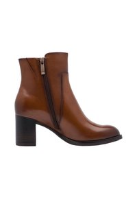 Bottine en cuir marron avec zip latéral et talon carré, finition lisse et bout arrondi.
