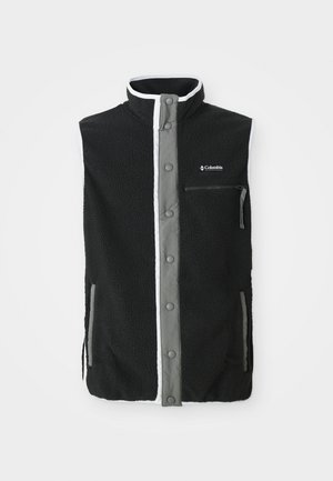 Chaleco de forro polar negro con tapeta frontal abotonada gris, bolsillo con cremallera en el pecho, dos bolsillos laterales y logo de Columbia Sportswear en el pecho.