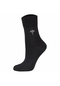 Svart ankelsocka med ribbad manschett, slät textur och subtil grå logotypdetalj på sidan. Socken är designad för komfort och passform.