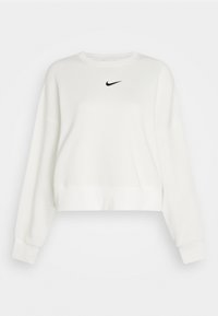 Vit kort tröja med långa ärmar, ribbade muddar och rundad halsringning. Har en liten svart Nike-logotyp på bröstet. Mjuk materialkänsla.