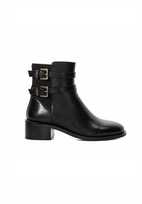 Bottine en cuir noir avec deux boucles décoratives, un bout rond et un talon bloc. Texture lisse avec une finition mate.