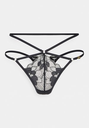 String noir en dentelle avec des motifs floraux complexes, doté de plusieurs fines lanières et de détails en métal doré pour un design minimaliste.