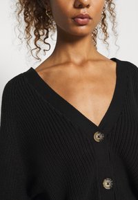 Monki Casaco de malha - black