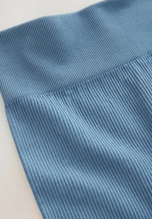 Tissu en bleu côtelé avec un motif texturé, doté d'une taille lisse. Le matériau semble doux et extensible, adapté aux vêtements ajustés.