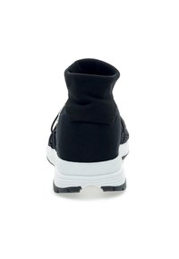 Black athletic sneaker with a knitted sock-like upper, white midsole, and textured black outsole. Features elastic laces and soft collar.