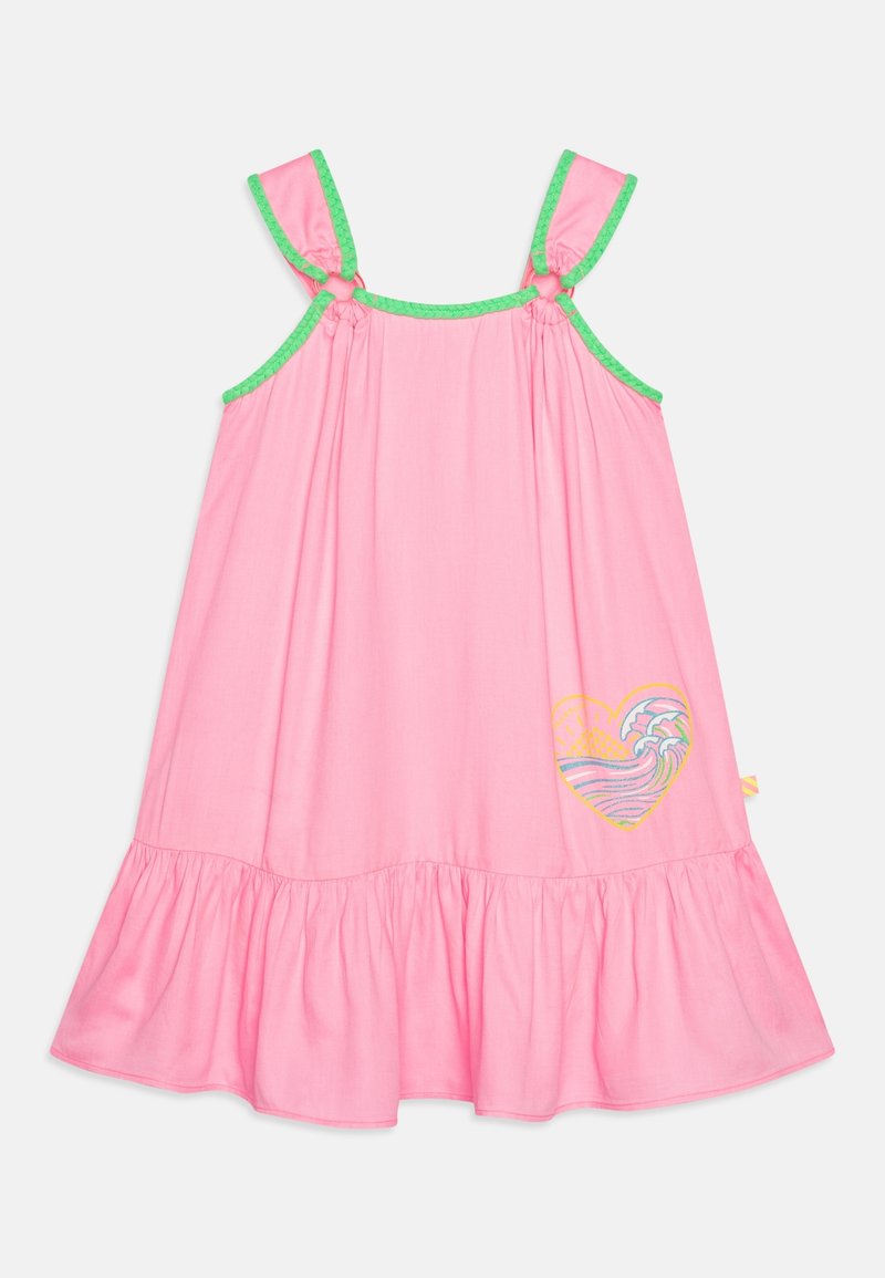 Robe rose sans manches avec bordure verte, ourlet à volants, et un motif cœur avec un soleil et une vague océanique en bas à droite.