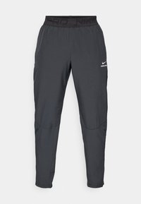 PANT - Verryttelyhousut - black/white
