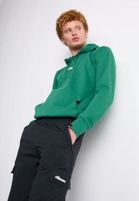 Ellesse TERATILO - Pantalon cargo - black