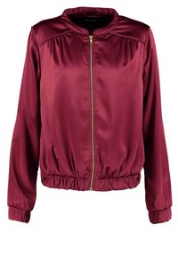 Burgundy, satin bomber jacket with a zip closure, gathered hem, and long sleeves. Features a round neckline and shoulder seams.