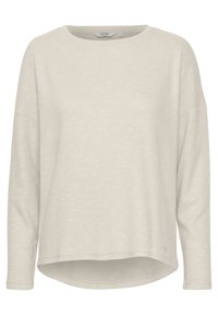 T-shirt long à manches longues beige clair avec un col rond et une coupe décontractée. Tissu doux et texturé avec un ourlet arrondi et un détail de marque discret en bas.