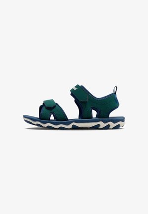 Grüne und marineblaue Kindersandalen mit verstellbaren Riemen, gezackter Profilsohle und synthetischem Obermaterial für Haltbarkeit und Komfort.