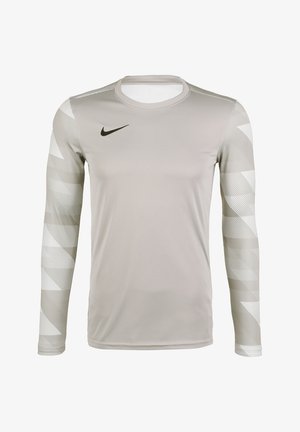 Long-sleeve grey athletic shirt with a crew neckline. Features textured white patterned accents on sleeves and a small black Nike logo.