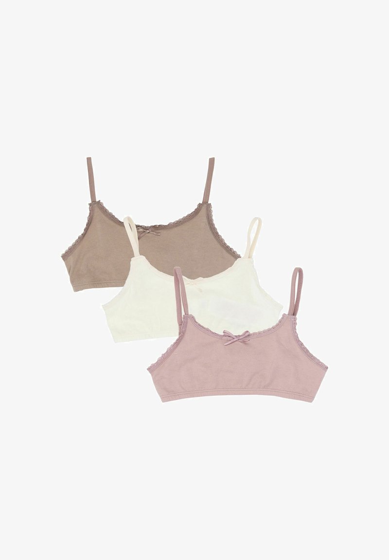 Trois soutiens-gorge d'entraînement en coton doux mauve, blanc et taupe, chacun avec des bretelles fines et un petit nœud à l'avant.