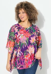 Blusa leggera con motivo floreale in tonalità di viola, rosa e verde; tessuto leggero, taglio ampio e design a scollo a barca con maniche larghe.
