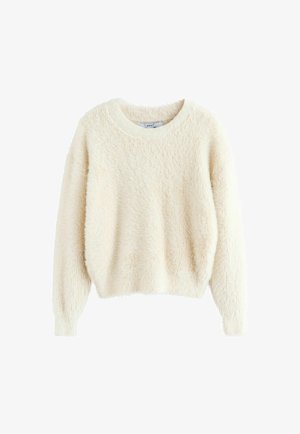 Maglione color crema realizzato in un materiale texture e soffice. Presenta un collo rotondo e maniche lunghe con polsi elastici.