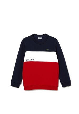 Marineblauer, weißer und roter Lacoste-Pullover mit Farbblock-Design, Rundhalsausschnitt, langen Ärmeln, Lacoste-Schriftzug und grünem Krokodil-Logo auf der Brust.