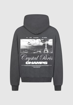 Grijze hoodie met een grafische print van de Eiffeltoren en tekst. Het materiaal lijkt een katoenmix, met een zachte textuur en geribde manchetten.