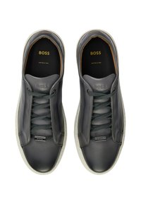 Dark grey leather sneakers with round toe, featuring matching laces, white rubber sole, and embossed branding on the tongue and side.