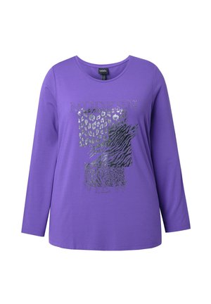 Fioletowa koszula z długim rękawem z metalicznymi naszywkami w zwierzęcy wzór oraz napisem „MODERN VIEW” z przodu, okrągły dekolt.