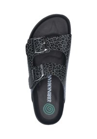 Black slide sandal with a leopard print pattern, two adjustable metal buckle straps, textured footbed, and a smooth black sole.