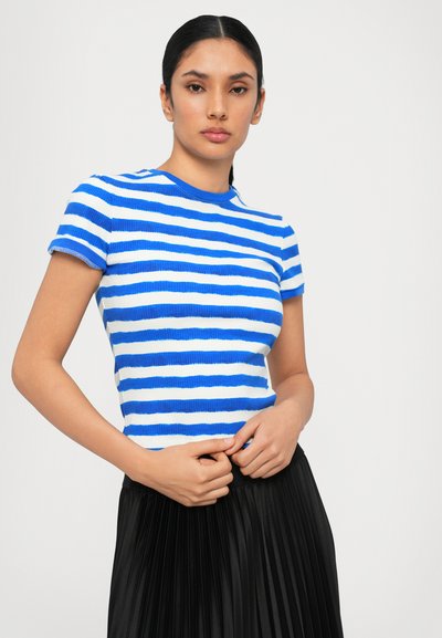 Blue and white striped ribbed short-sleeve top, featuring a round neckline and a fitted silhouette, paired with a black pleated skirt.