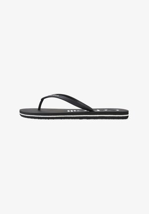 Black flip-flop with a textured rubber sole, featuring a minimalist design, white striping, and a logo on the strap.