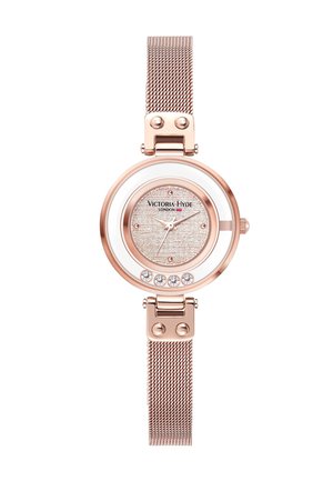 Roségoldene Mesh-Uhr mit rundem Gehäuse, weißem Zifferblatt, strukturiertem silbernen Ziffernblatt und fünf Kristallakzenten auf dem Ziffernblatt. Verfügt über einen Verschluss mit Klappmechanismus.