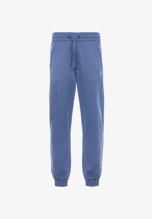 Pantaloni della tuta in cotone blu con vita elasticizzata, cordoncino, tasche laterali e polsini a costine. Dettaglio del logo sul fianco sinistro.