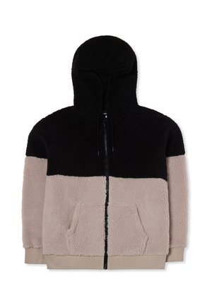 Giacca con cappuccio, con una parte superiore nera e una parte inferiore beige, realizzata in tessuto soffice. Presenta una cerniera frontale e due tasche.