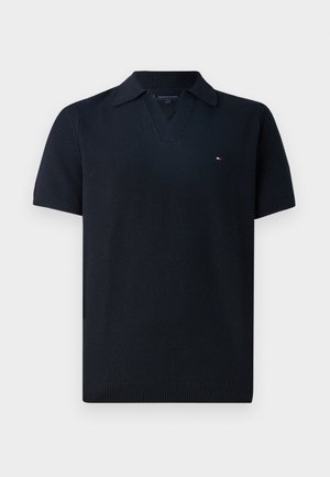 Navyblaue kurzärmelige Poloshirt mit V-Ausschnitt, strukturiertem Stoff und geripptem Saum. Verfügt über ein kleines Logo-Detail auf der Brust.