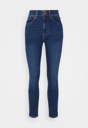 High-waisted dark blue denim jeans with a slim fit, featuring two front pockets, a zip fly, and contrasting stitching.