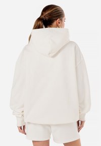 Pegador CLARITA - Camisola - washed warm white gum