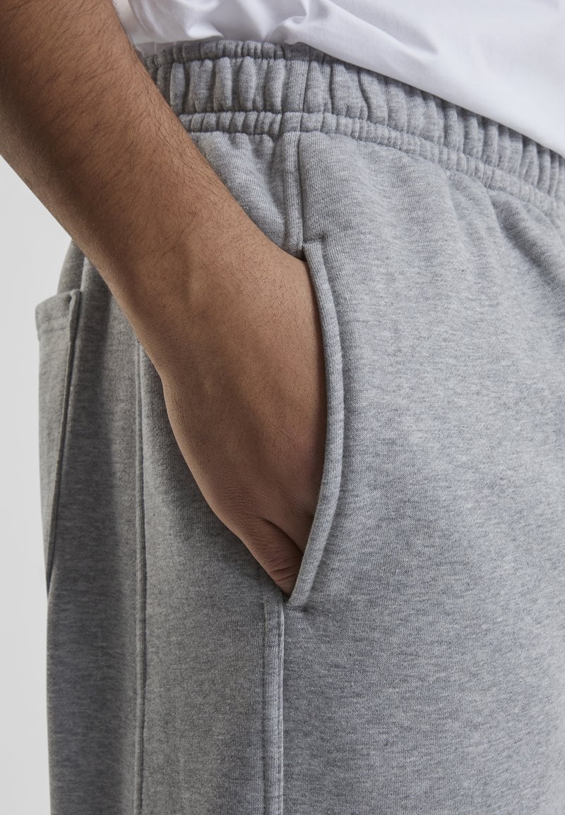 Urban Classics Tracksuit bottoms grey/mottled grey Zalando
