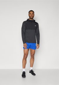 New Balance GRID BALACLAVA HOODIE - Pikkade varrukatega topp - black