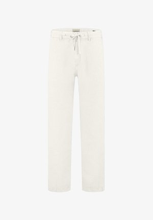 Fehér vászon nadrág, megkötő derékkal és egyenes szabással. Simább textúra, minimalista részletek és lazább felszerelés.