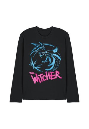 Schwarzes Langarmshirt mit blau stilisiertem Wolfs-Kopf- und Vogeldesign sowie pinkem Schriftzug „The Witcher“ auf der Vorderseite.