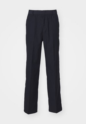 Marineblauwe broek gemaakt van lichtgewicht stof, met een recht gesneden ontwerp, elastische tailleband en zonder zichtbare zakken of patronen.