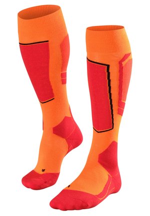 Calze fino al ginocchio di un vivace arancione con accenti rossi e motivi geometrici. Realizzate in materiale elastico, presentano sezioni rinforzate nella punta e nel tallone.