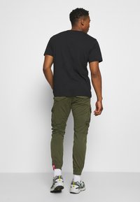 Alpha Industries SPY - Cargo trousers - dark olive