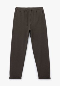 Donkerbruine sweatpants van een textuur met wafelbreisel, elastische tailleband en verstelbare koordjes. Tapered beenontwerp.