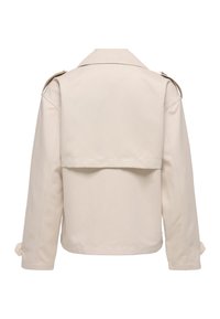 Veste beige courte à manches longues, avec un empiècement dans le dos, des épaulettes aux épaules et des pattes ajustables aux poignets.