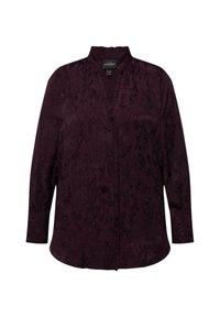 Dark purple blouse with a mandarin collar, button-down front, long sleeves, and floral pattern texture throughout.