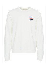 Witte sweatshirt met lange mouwen, ronde halslijn en een grafische print aan de voorkant met een blauw, roze en zwart cirkelontwerp. Zachte textuur, casual pasvorm.