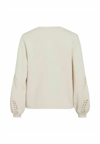Felpa color crema con collo rotondo, maniche lunghe a sbuffo con motivi a foglia intagliati e una texture morbida e liscia.