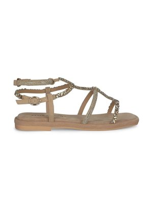 Sandali piatti beige con cinturini incrociati adornati da accenti metallici e strass, dotati di una cinghia alla caviglia regolabile per una vestibilità ottimale.